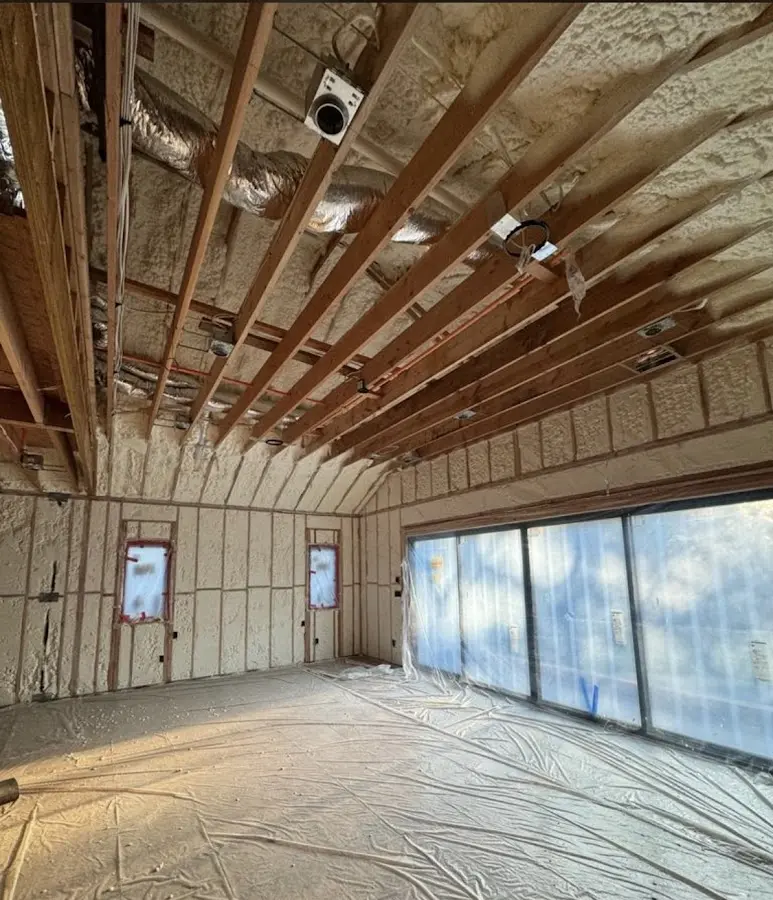 Interior walls and ceiling insulated with spray foam during new construction in Wawayanda